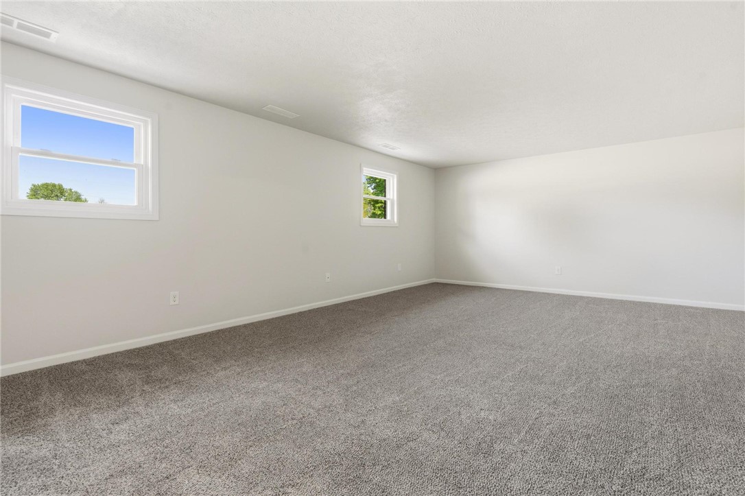 1353 Foust Road Xenia, OH 45385 - Photo 46 of 50 This expansive room offers a blank canvas for personalized living with ample natural light.