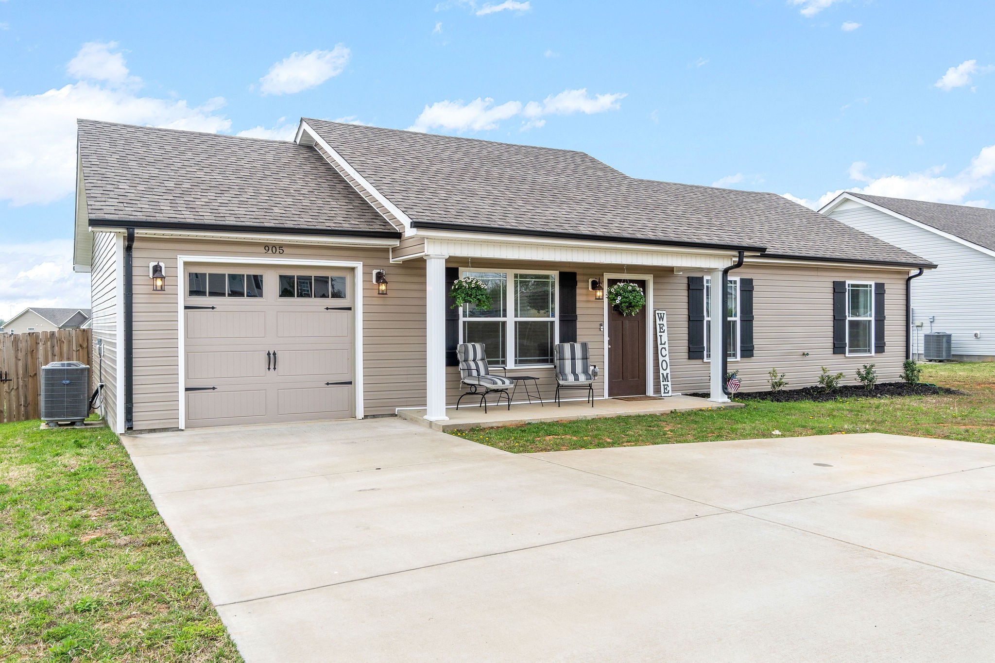 905 Hugh Hunter Road Oak Grove, KY 42262 - Photo 1 of 33 a house that has a big yard and large trees
