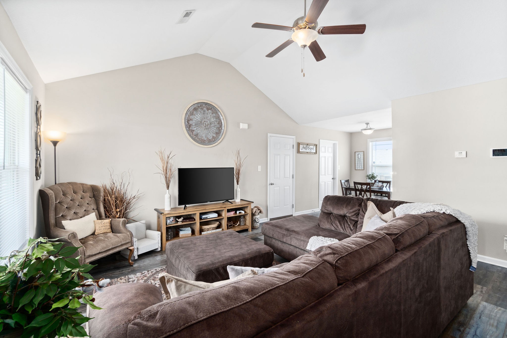 905 Hugh Hunter Road Oak Grove, KY 42262 - Photo 5 of 33 a living room with furniture and a flat screen tv
