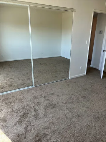 an empty room with closet