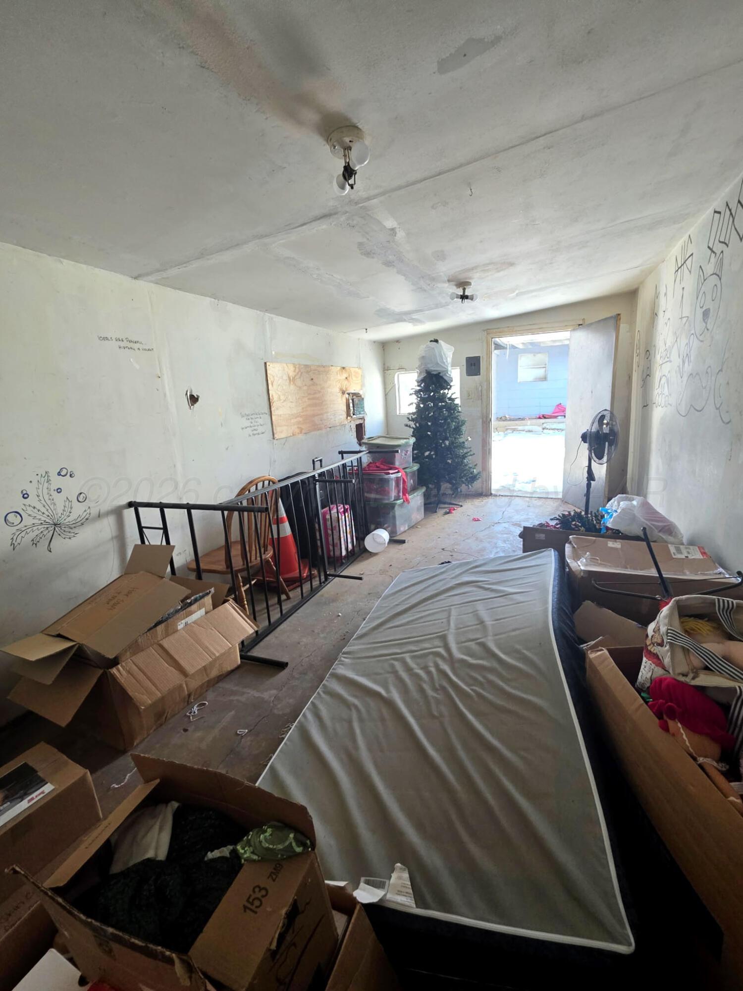 4003 South Van Buren Street Amarillo, TX 79110 - Photo 24 of 25 a bed room with a bed