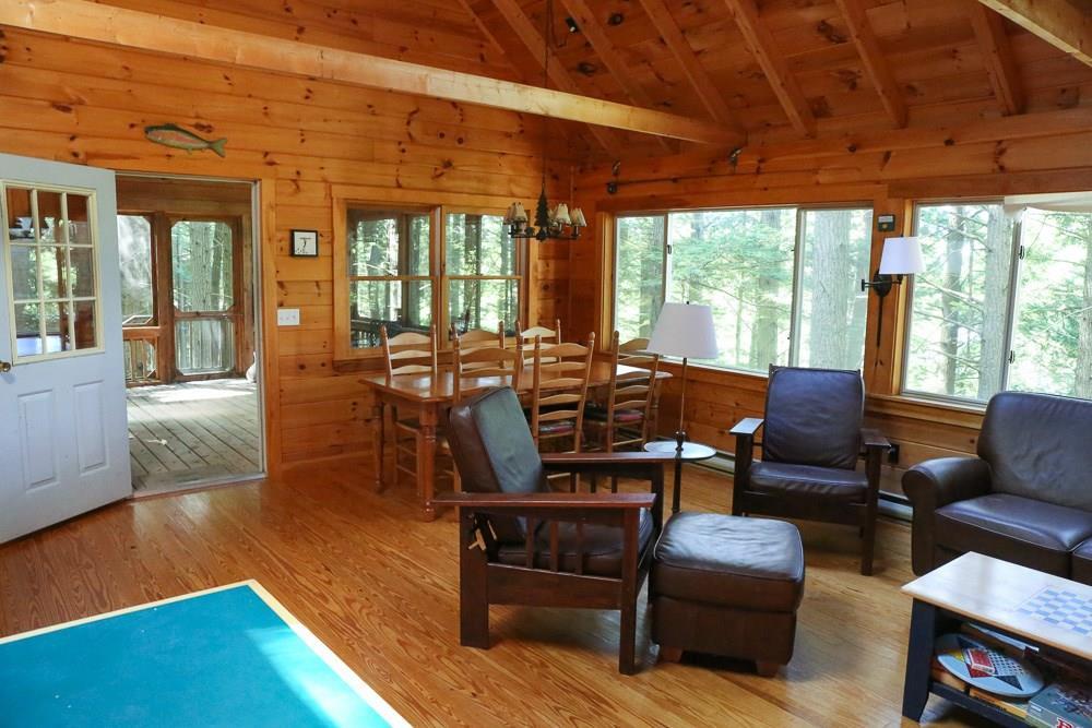 118 Crystal Spring Lane Rome, ME 04963 - Photo 6 of 20 Living room over looking the waterfront.