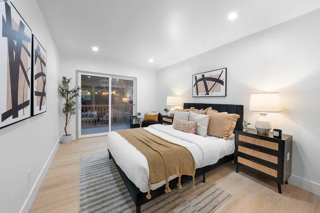 a bedroom with a bed and a walk in closet