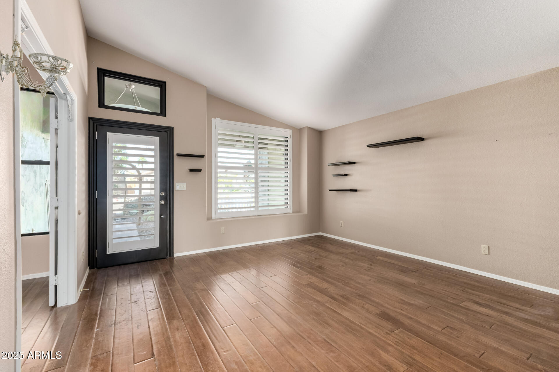 14841 South 46th Place Phoenix, AZ 85044 - Photo 11 of 43 wooden floor in an empty room with a window