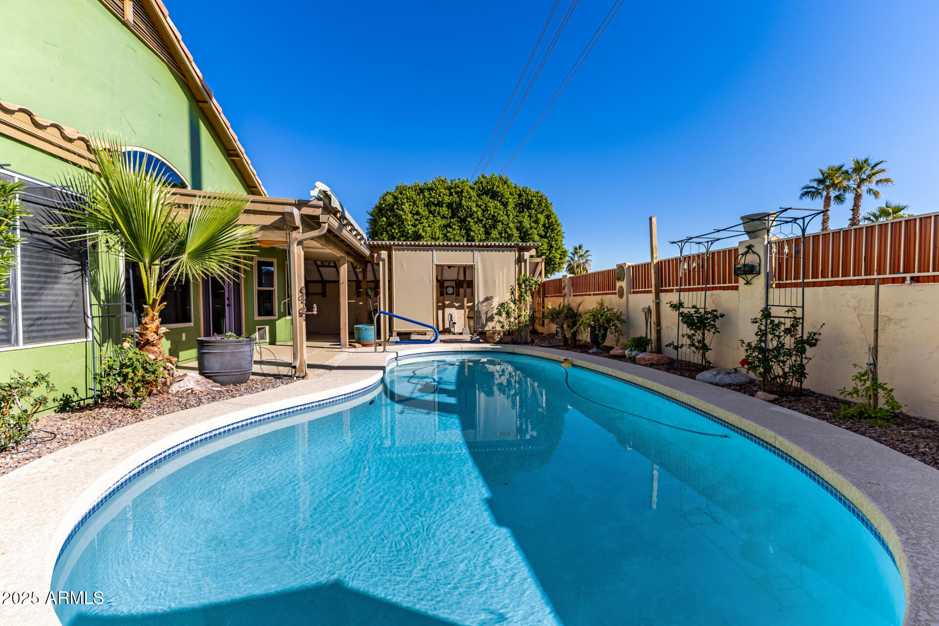 14841 South 46th Place Phoenix, AZ 85044 - Photo 39 of 43 a view of a house with swimming pool