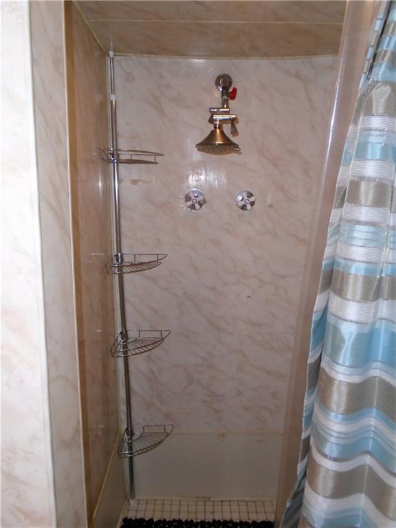 1001 7th Avenue Conway, PA 15027 - Photo 21 of 36 a bathroom with a bathtub