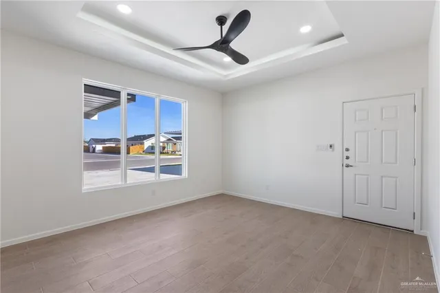 a view of an empty room with a window