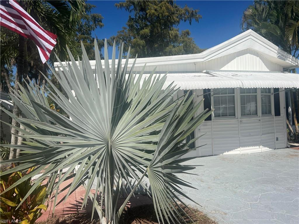 159 Cheetah Drive, Unit 159 Naples, FL 34114 - Photo 3 of 31 a view of outdoor space and yard