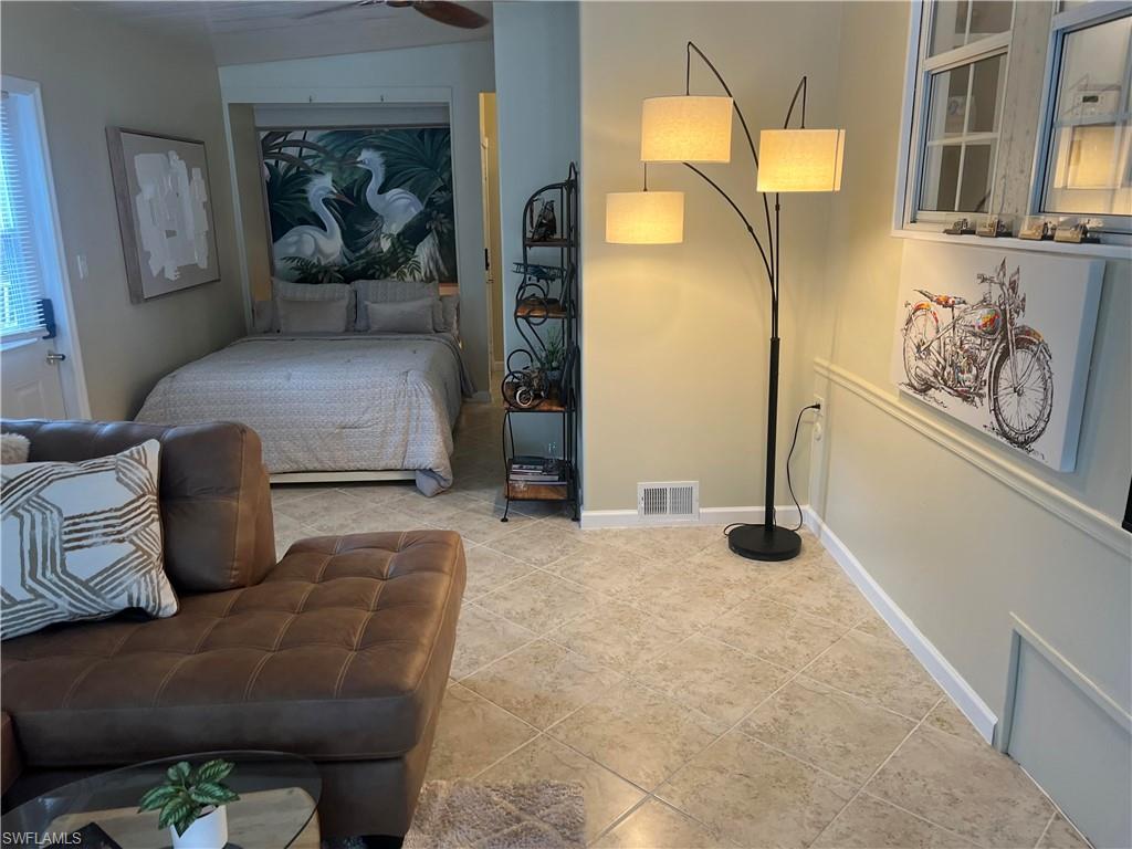 159 Cheetah Drive, Unit 159 Naples, FL 34114 - Photo 8 of 31 a living room with furniture