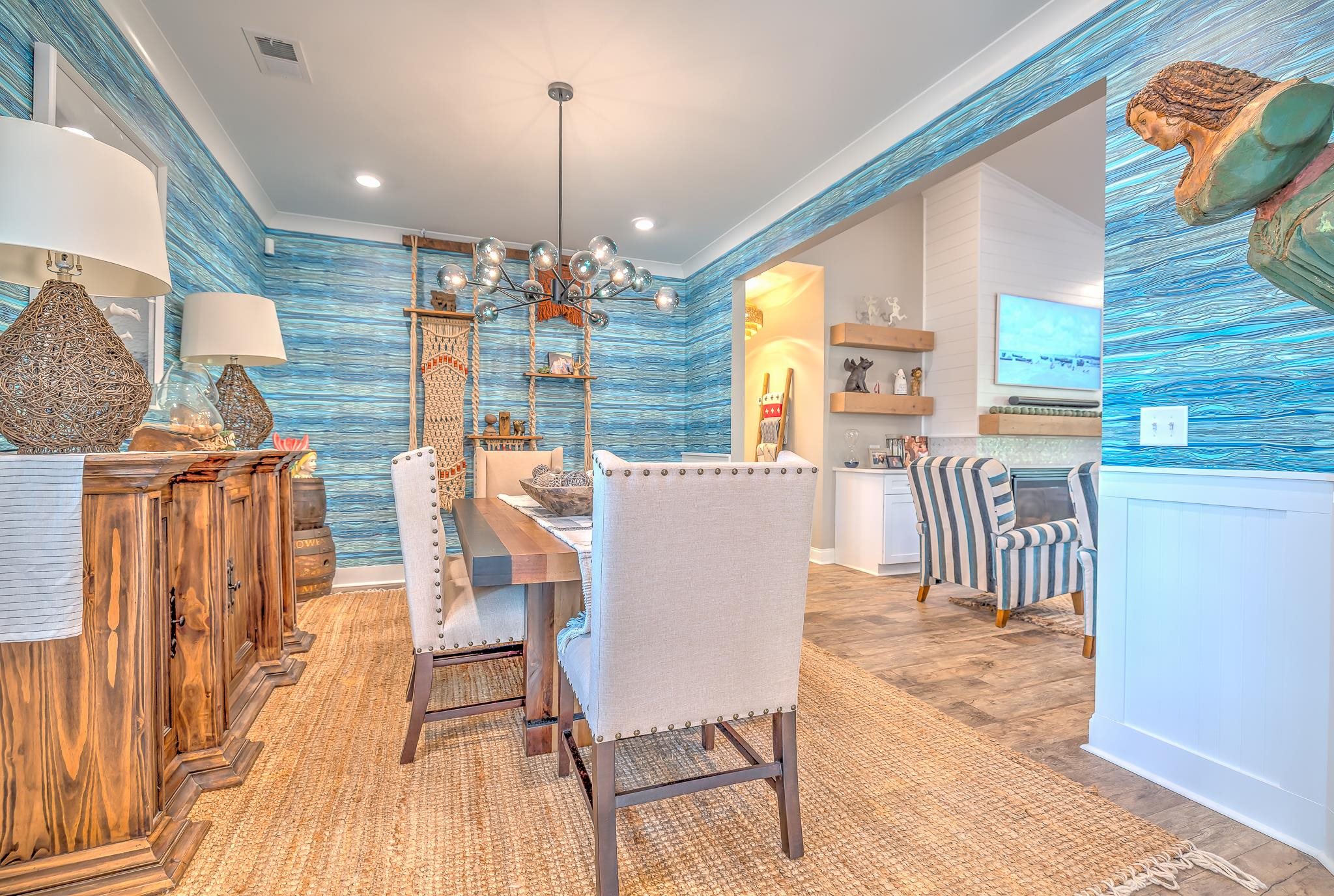 2488 Goldfinch Drive Myrtle Beach, SC 29577 - Photo 11 of 38 Dining area featuring wallpapered walls, ornamental molding, wood finished floors, a chandelier, and recessed lighting