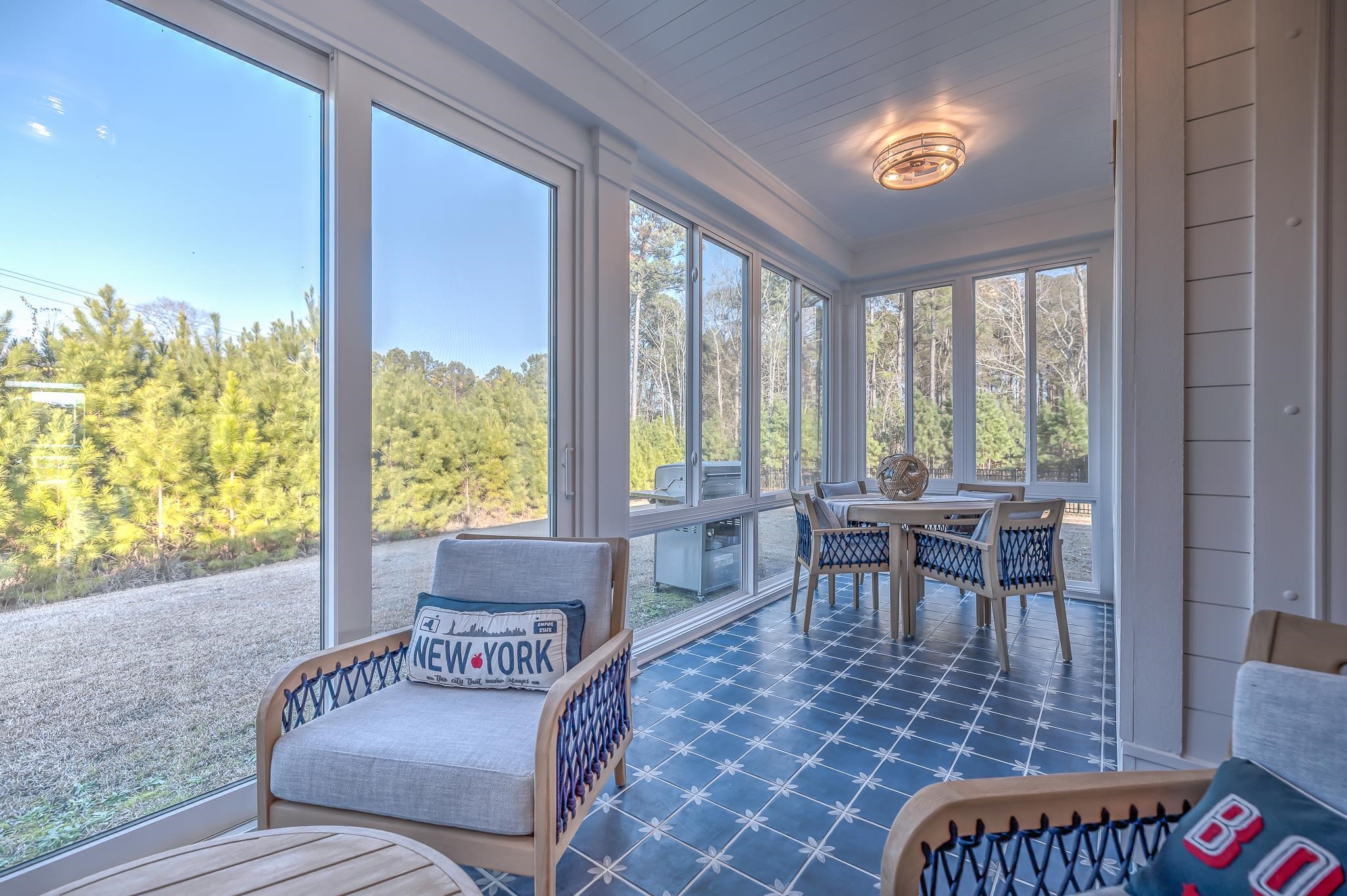 2488 Goldfinch Drive Myrtle Beach, SC 29577 - Photo 17 of 38 Sunroom / solarium featuring ornamental molding