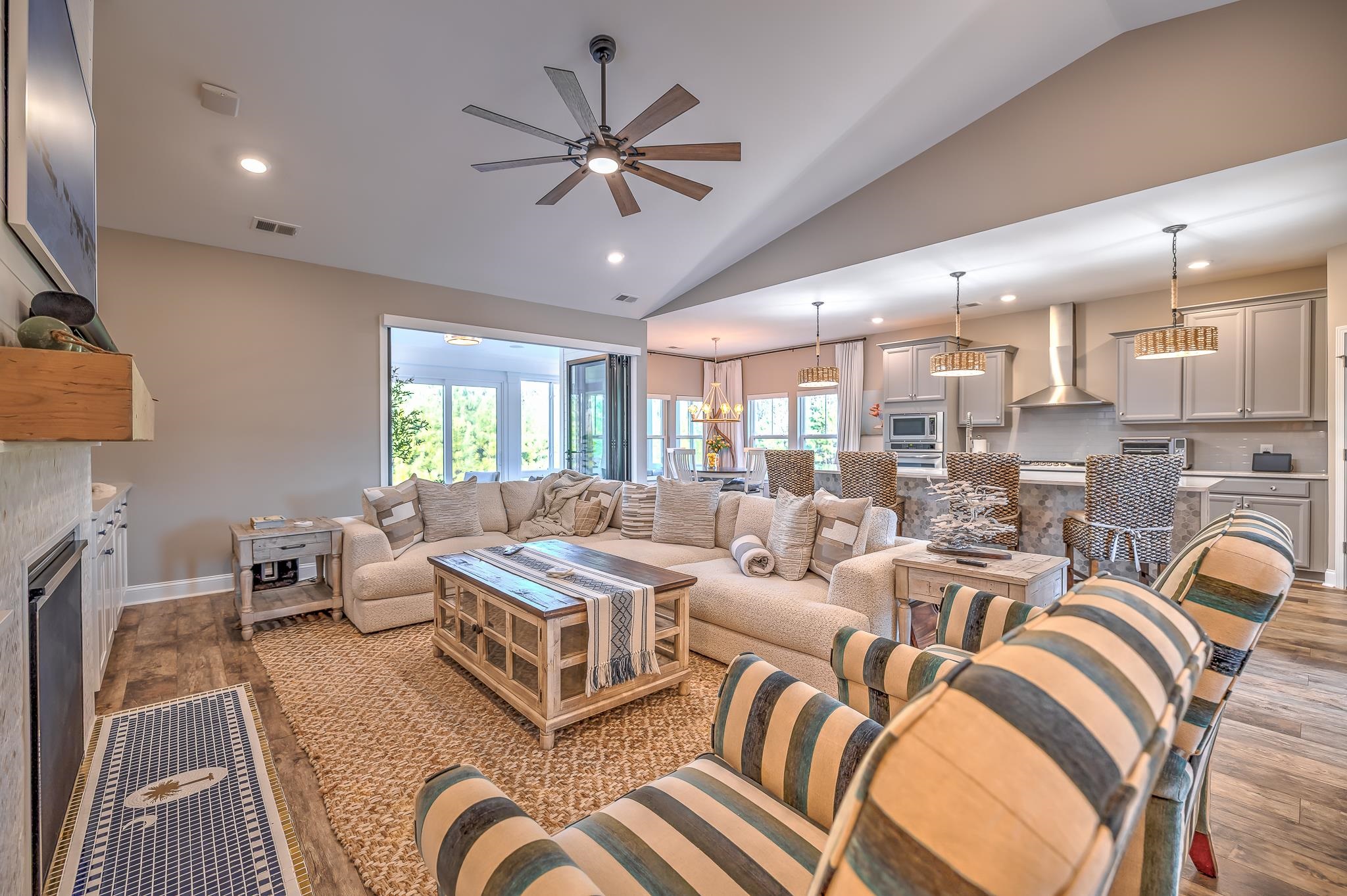 2488 Goldfinch Drive Myrtle Beach, SC 29577 - Photo 21 of 38 Living room featuring a fireplace, dark wood finished floors, vaulted ceiling, recessed lighting, and a ceiling fan