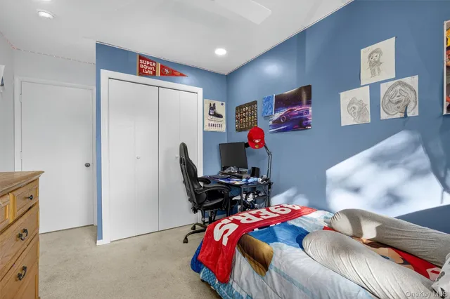 a bedroom with a bed and furniture