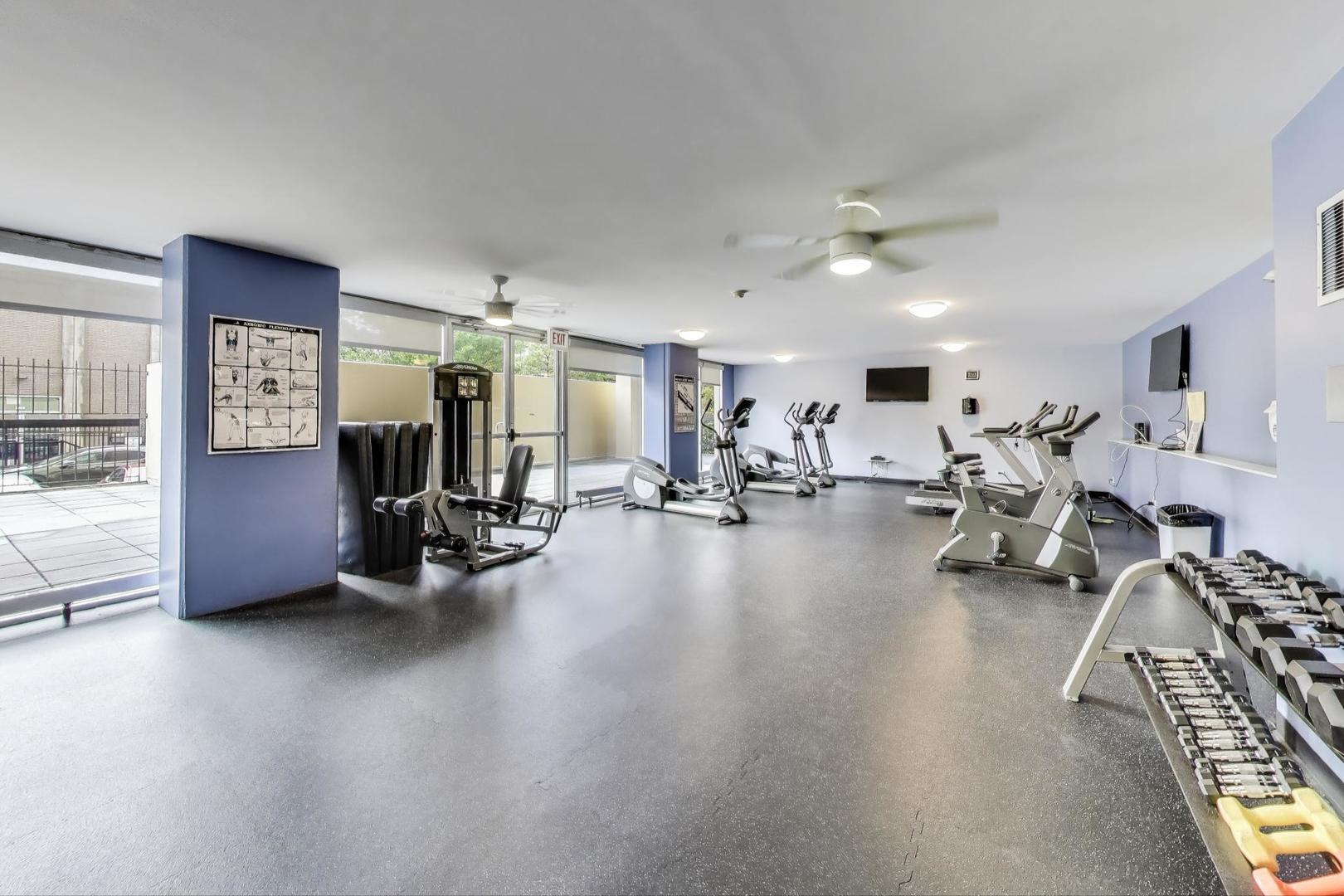 5201 South Cornell Avenue, Unit 20E Chicago, IL 60615 - Photo 19 of 20 a view of a room with gym equipment