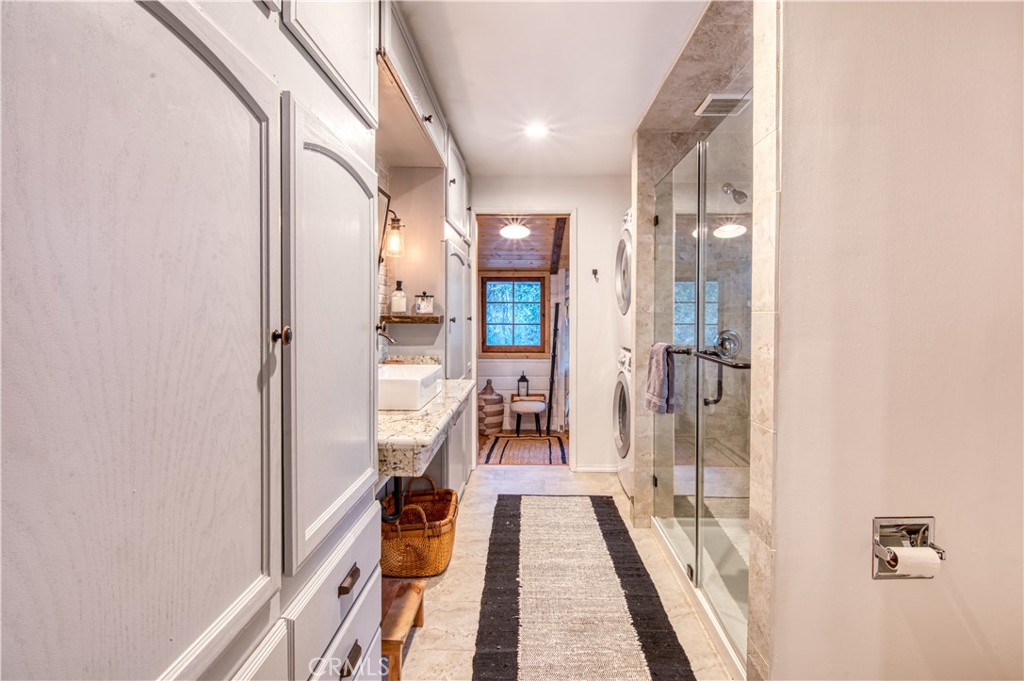 9287 Corral Road Forest Falls, CA 92339 - Photo 21 of 26 a view of a hallway with wooden floor and staircase