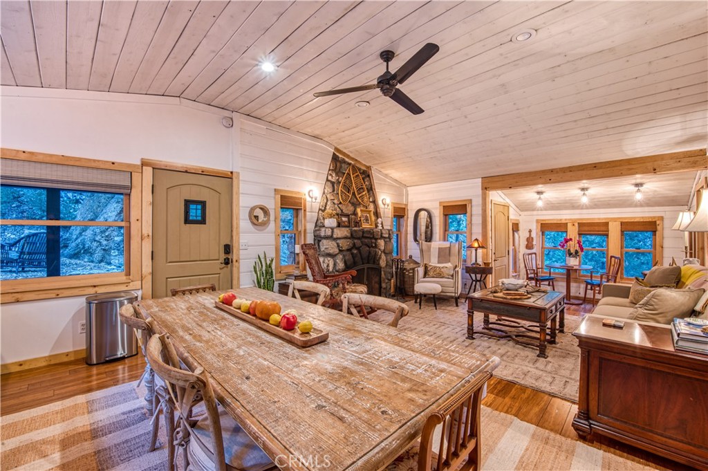 9287 Corral Road Forest Falls, CA 92339 - Photo 7 of 26 a living room with furniture and a chandelier