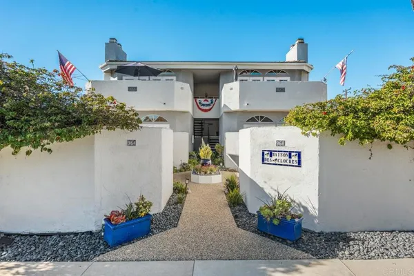 a view of entryway with flower pots