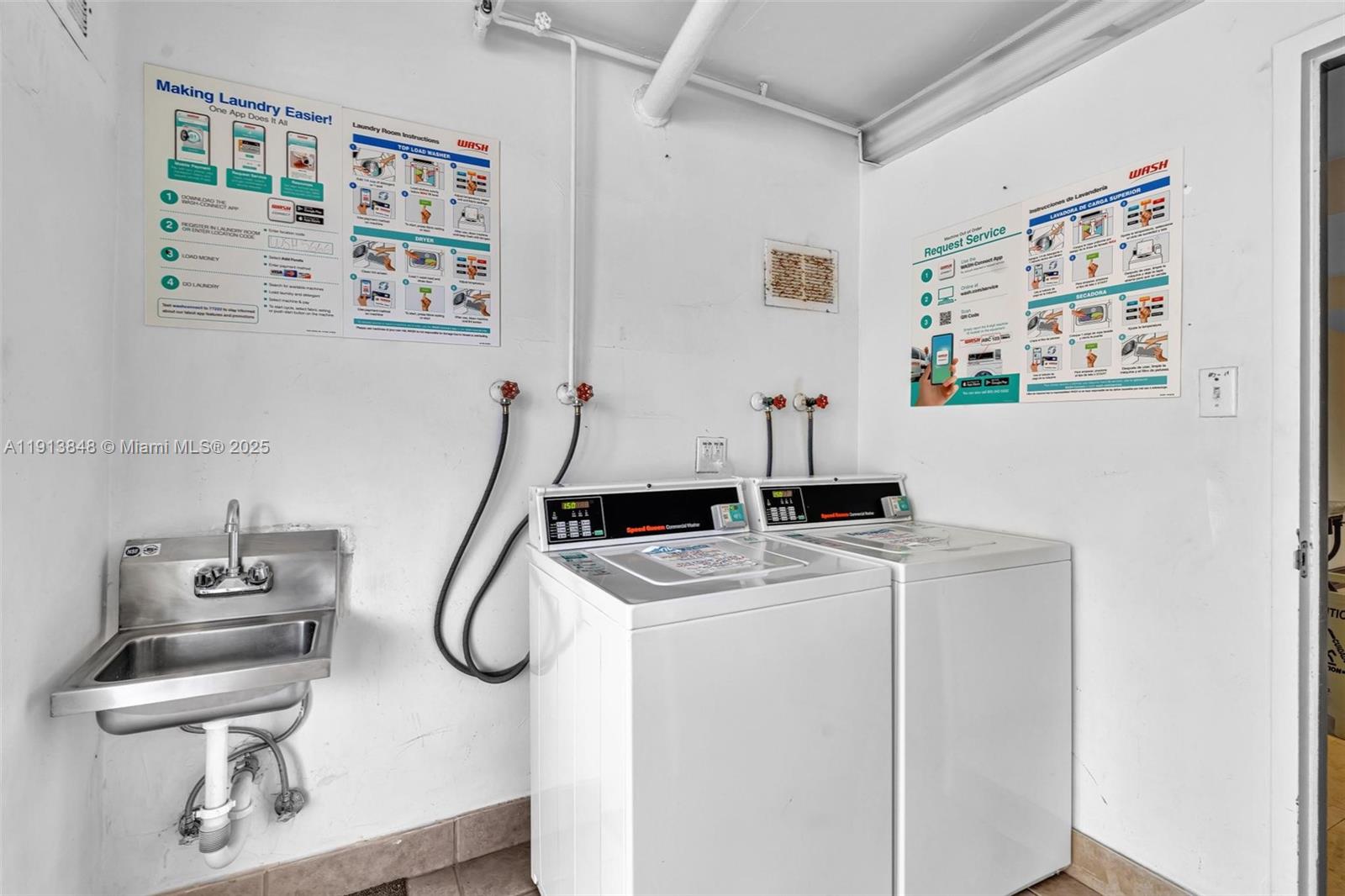 9195 Collins Avenue, Unit 303 Surfside, FL 33154 - Photo 37 of 44 a room with gym equipment and large mirror