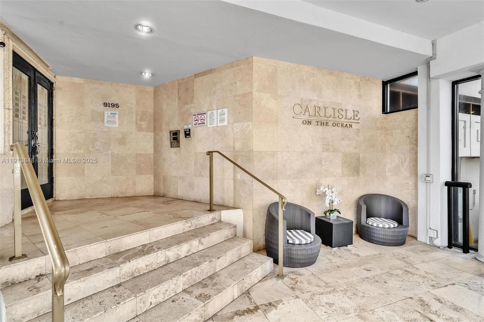 9195 Collins Avenue, Unit 303 Surfside, FL 33154 - Photo 38 of 44 a view of an entryway with staircase