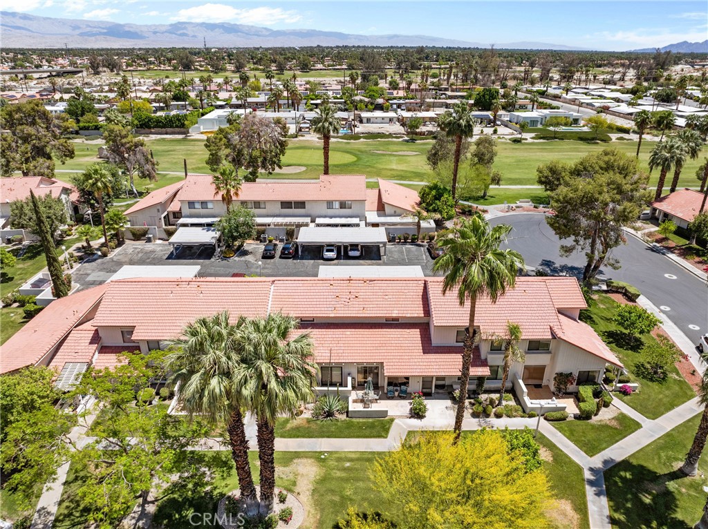 6134 Arroyo Road, Unit 3 Palm Springs, CA 92264 - Photo 28 of 35 an aerial view of residential houses with outdoor space