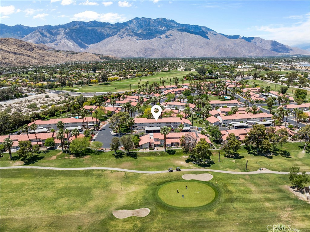 6134 Arroyo Road, Unit 3 Palm Springs, CA 92264 - Photo 30 of 35 a view of a city with an ocean