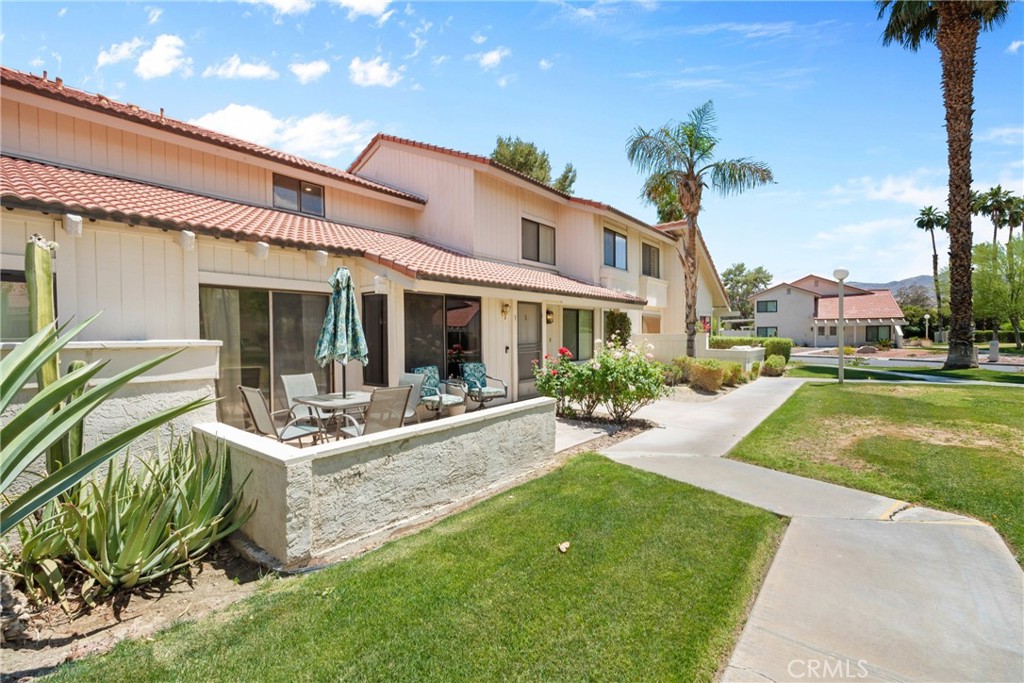 6134 Arroyo Road, Unit 3 Palm Springs, CA 92264 - Photo 3 of 35 a view of a house with backyard porch and sitting area