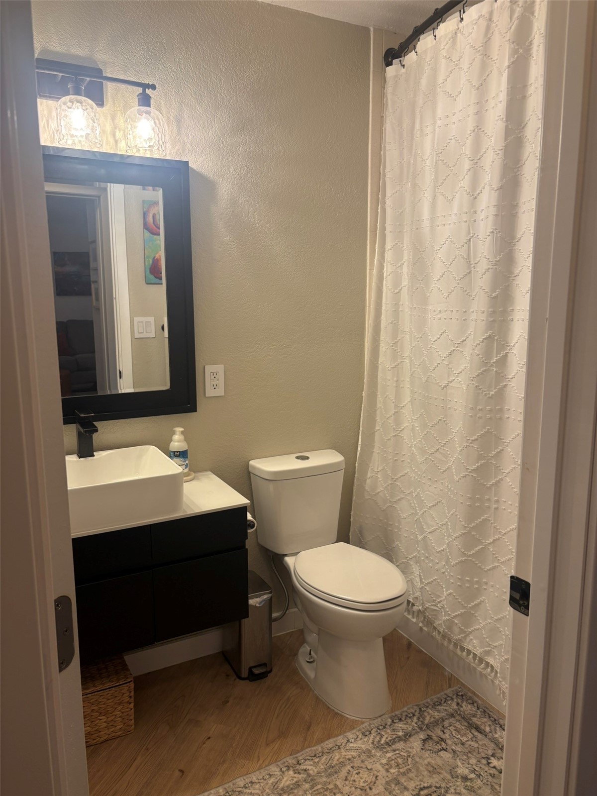 140 Atlantic Lode, Unit 9 Breckenridge, CO 80424 - Photo 3 of 7 a bathroom with a sink a toilet and mirror