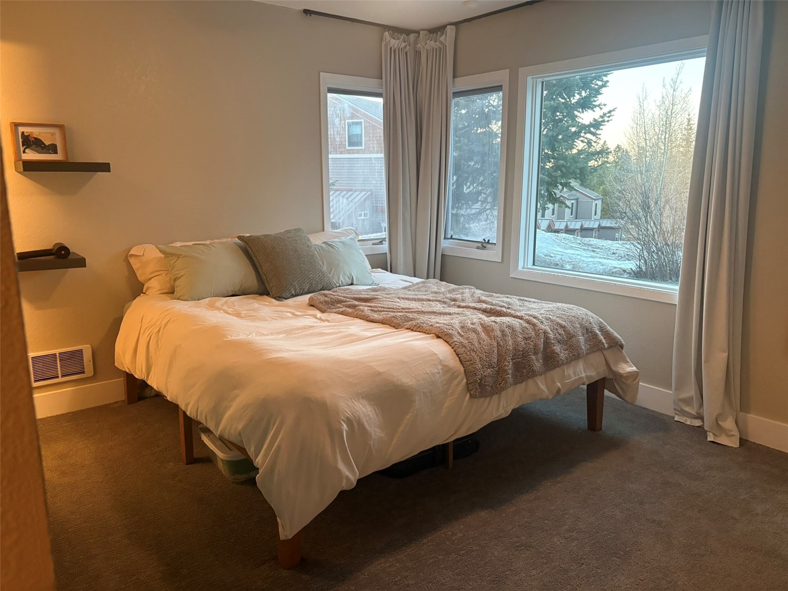 140 Atlantic Lode, Unit 9 Breckenridge, CO 80424 - Photo 5 of 7 a bed sitting in a bedroom next to a window