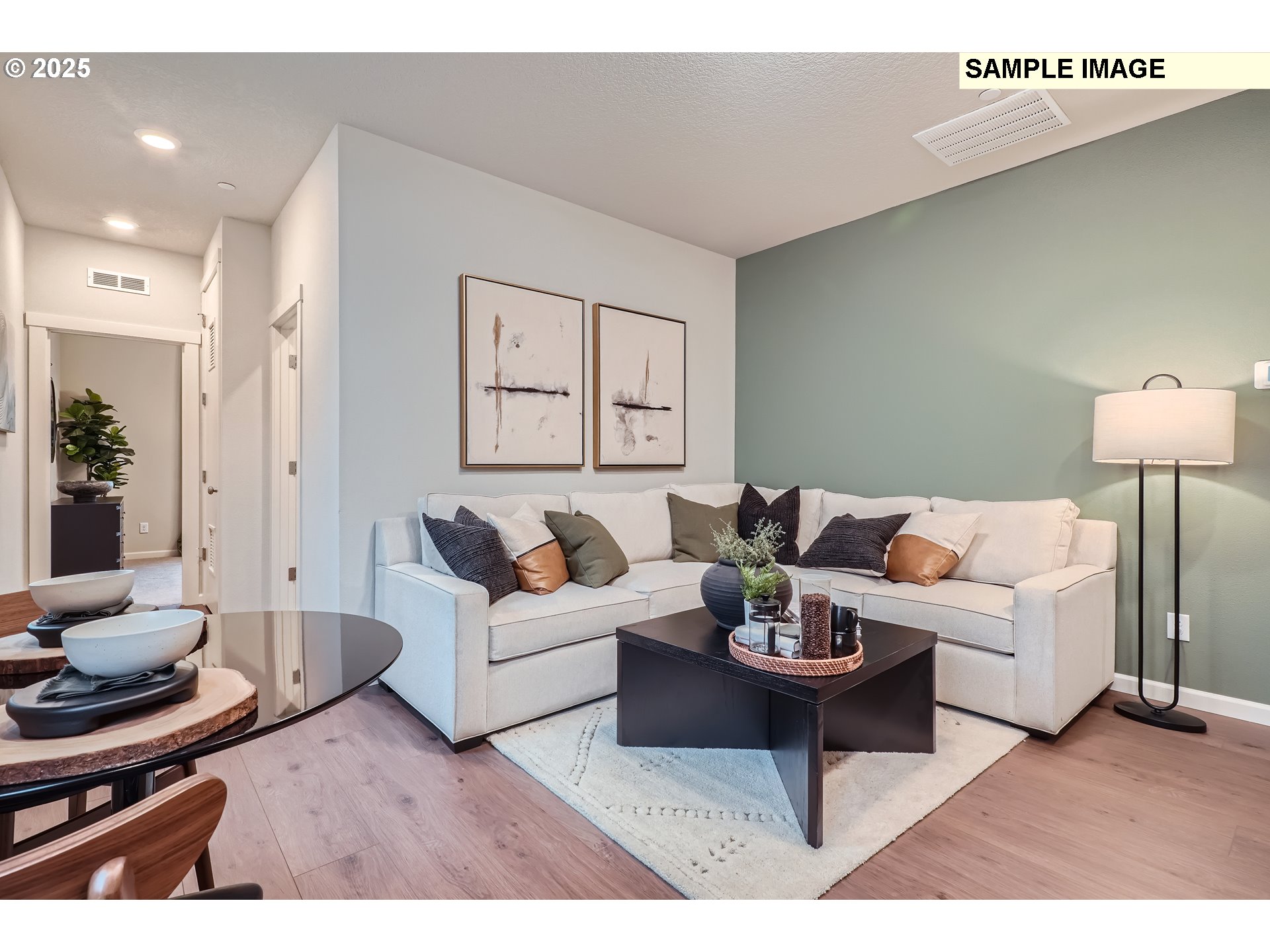 2636 South 4th Way Ridgefield, WA 98642 - Photo 11 of 34 a living room with furniture a rug and a lamp