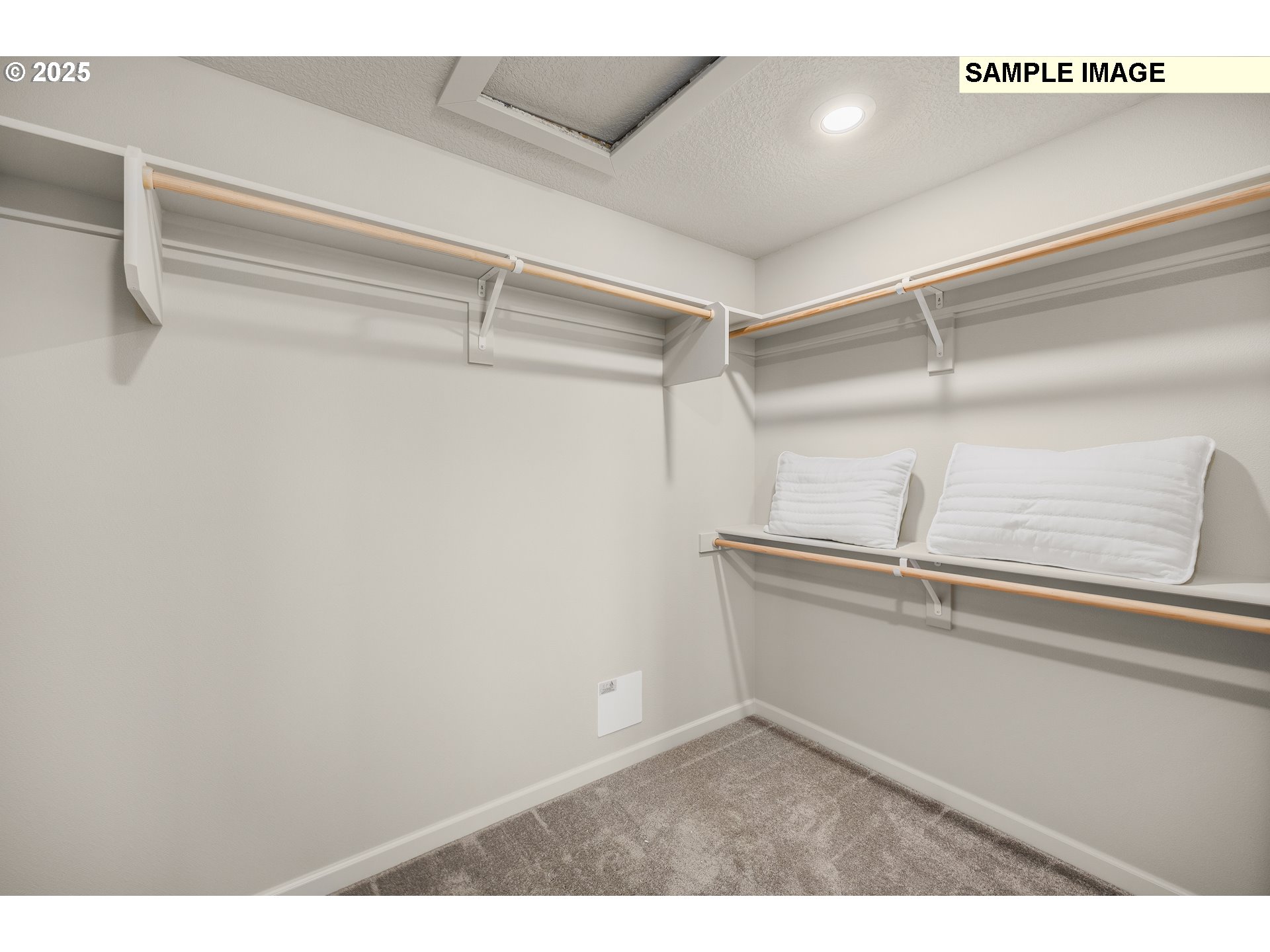 2636 South 4th Way Ridgefield, WA 98642 - Photo 15 of 34 a view of a room with racks on the wall