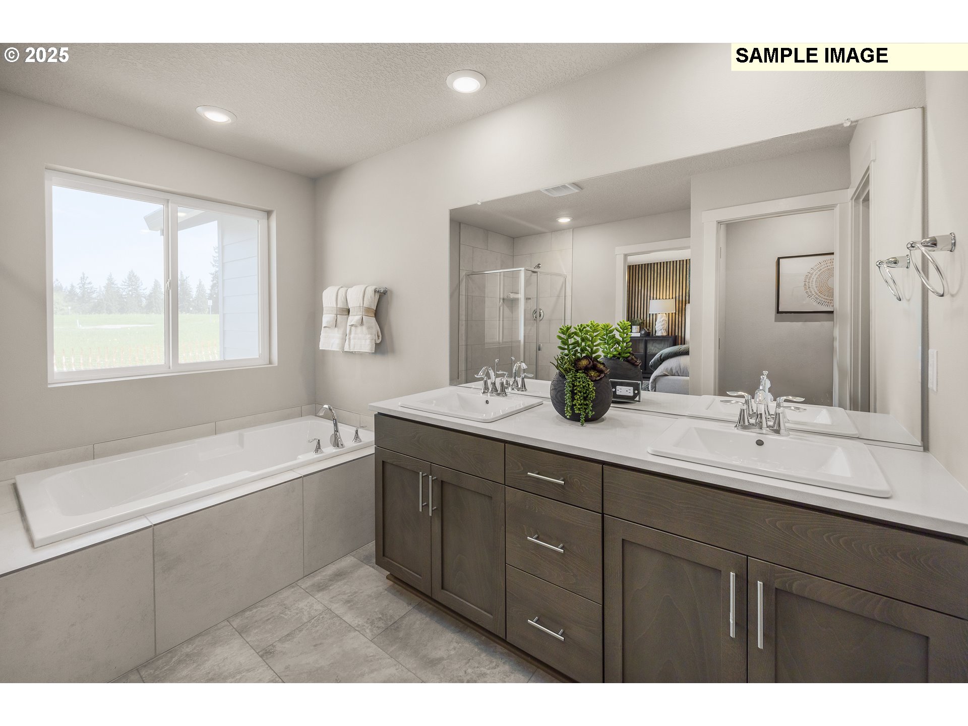 2636 South 4th Way Ridgefield, WA 98642 - Photo 26 of 34 a bathroom with a tub a sink double and mirror