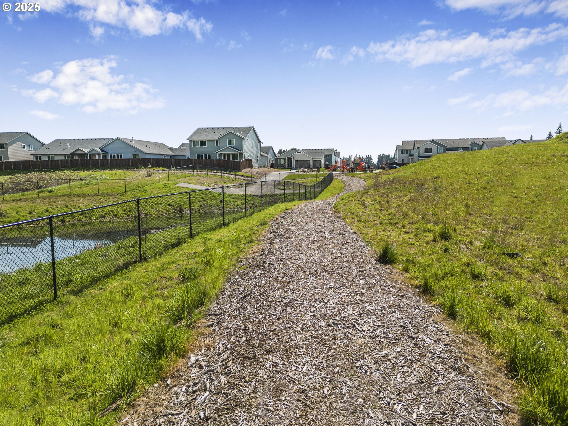 2636 South 4th Way Ridgefield, WA 98642 - Photo 28 of 34 a view of a lake with a big yard