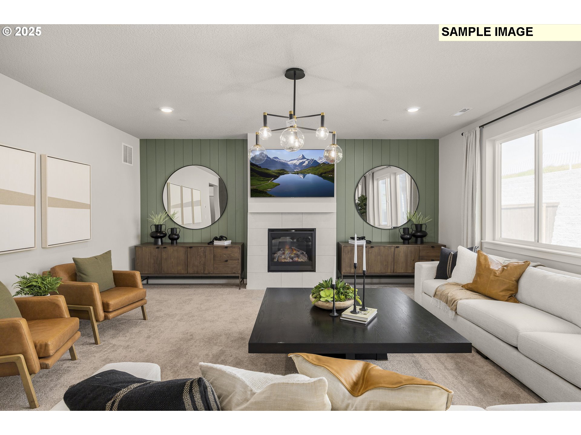 2636 South 4th Way Ridgefield, WA 98642 - Photo 8 of 34 a living room with furniture a mirror and a fireplace