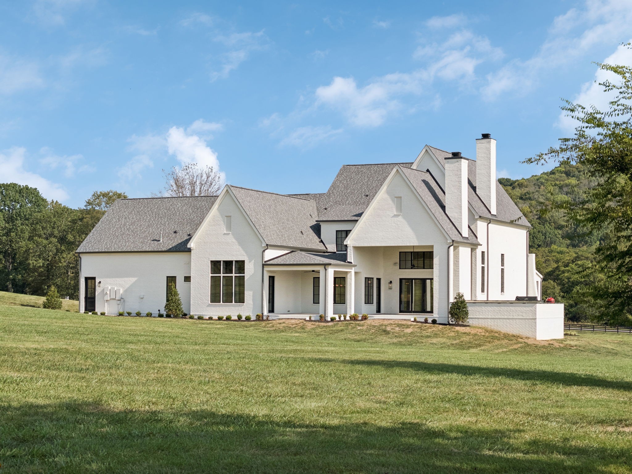 2245 Skinner Road Arrington, TN 37014 - Photo 13 of 98 a front view of a house with a garden