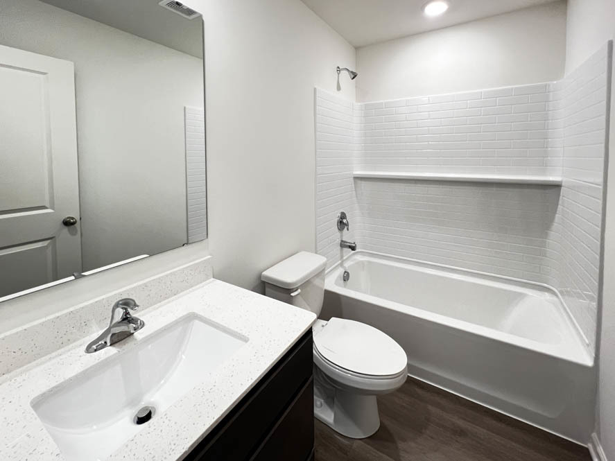 392 Summit Circle Lombard, IL 60148 - Photo 7 of 61 a bathroom with a sink and a mirror