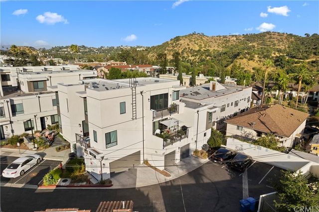 a view of a city with tall buildings