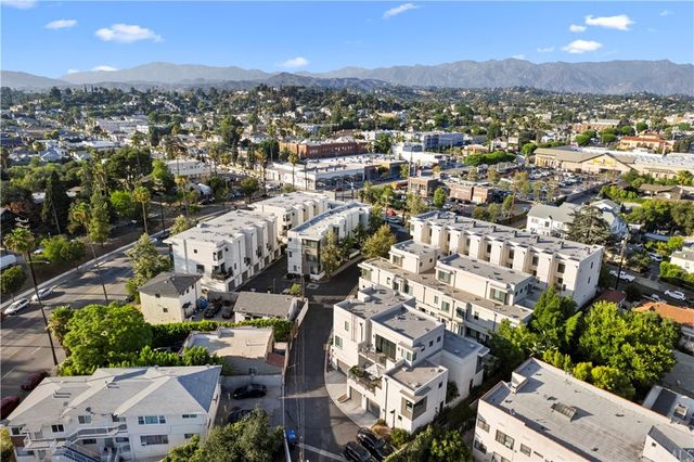 a view of a house with a street