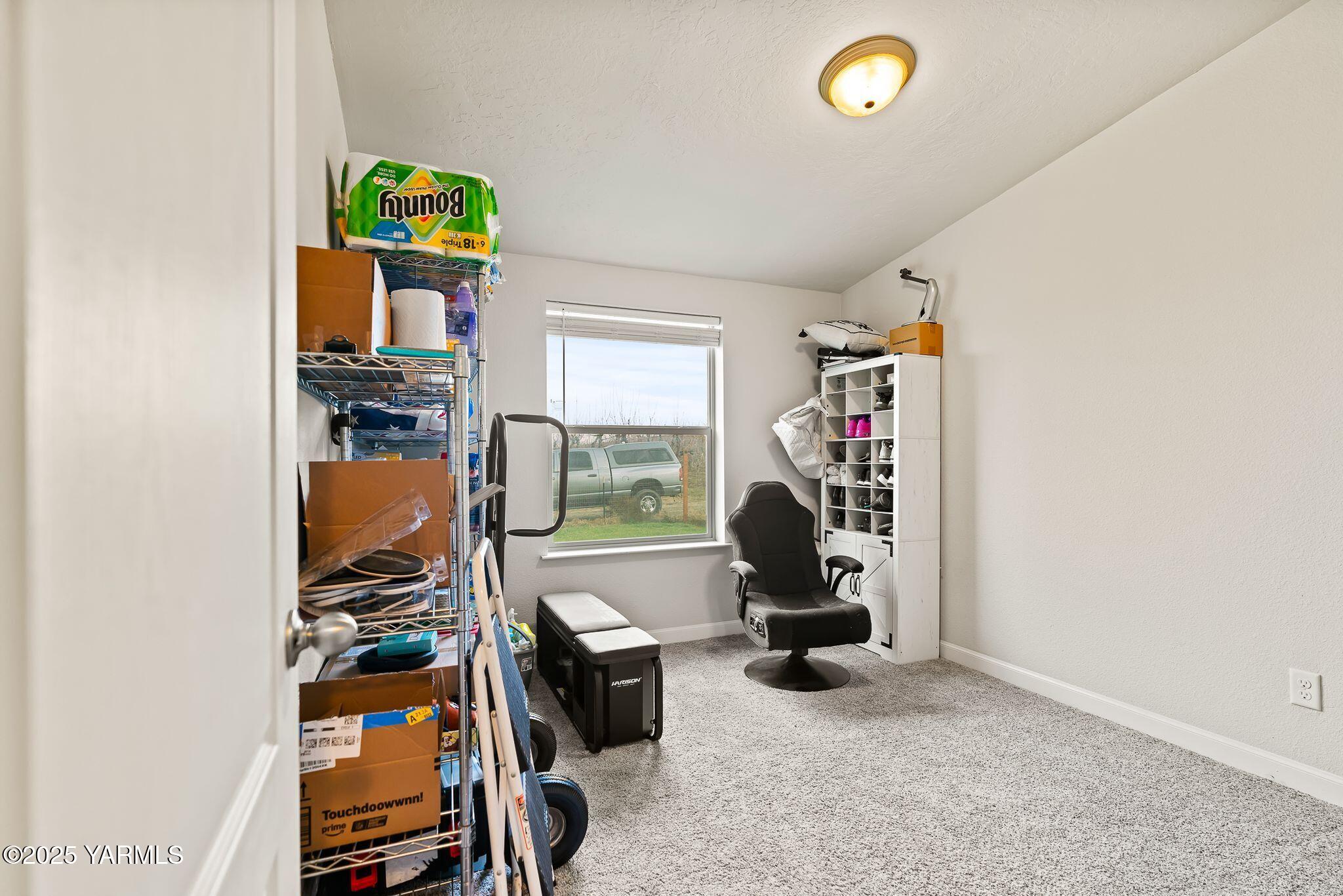 1351 Nass Road Granger, WA 98932 - Photo 18 of 38 a view of a room with gym equipment