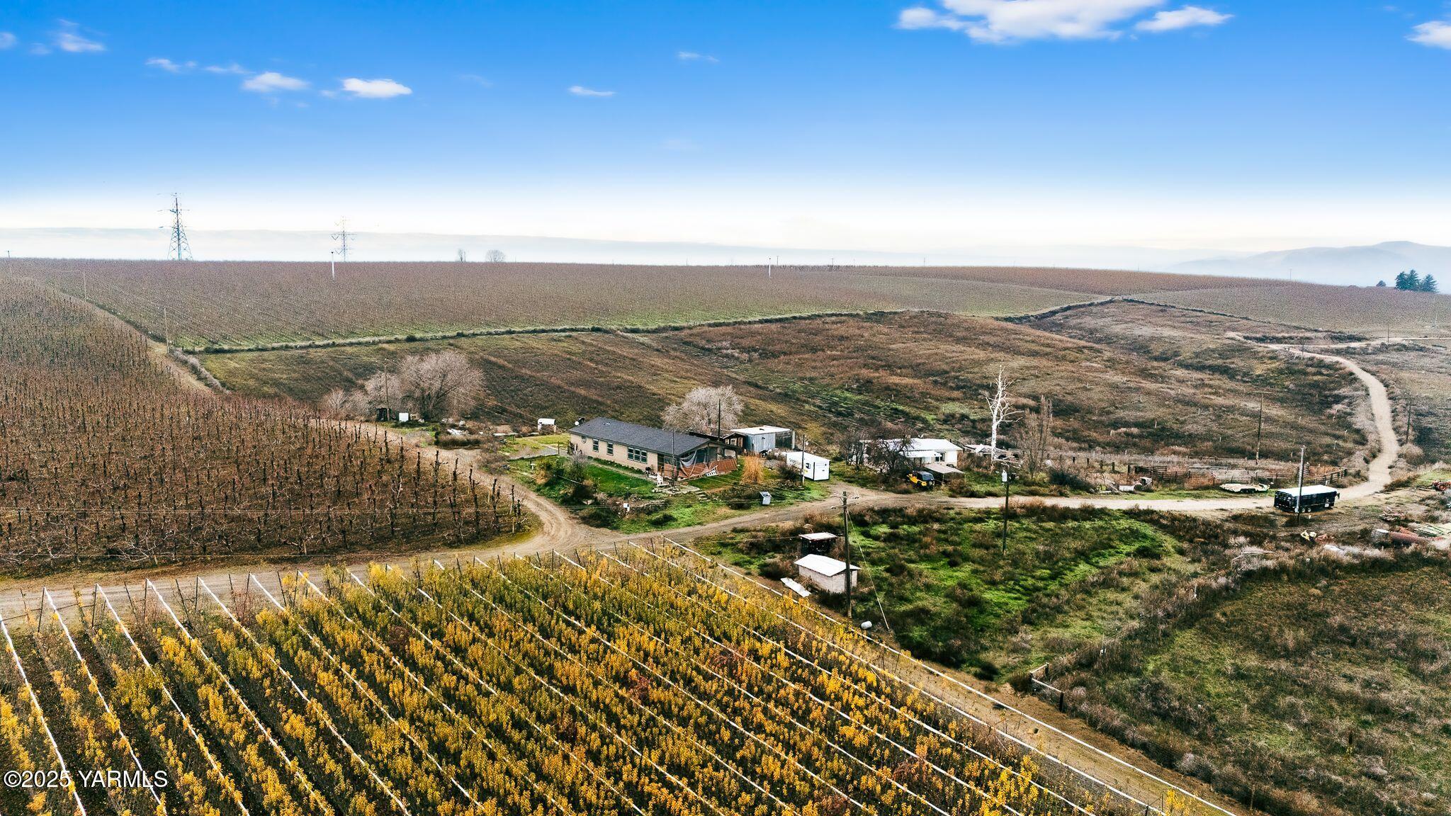1351 Nass Road Granger, WA 98932 - Photo 32 of 38 an aerial view of residential houses with outdoor space