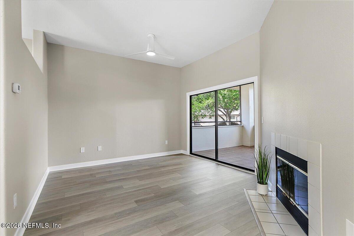 10150 Belle Rive Boulevard, Unit 204 Jacksonville, FL 32256 - Photo 3 of 19 03-Living Room to Lanai