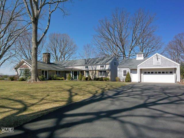 63 Goodridge Road Redding, CT 06896 - Photo 1 of 1 a front view of a house with a yard