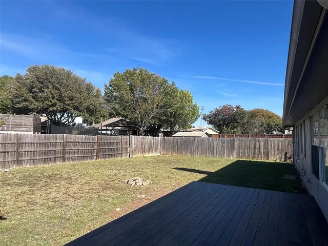 a view of a lake with a house