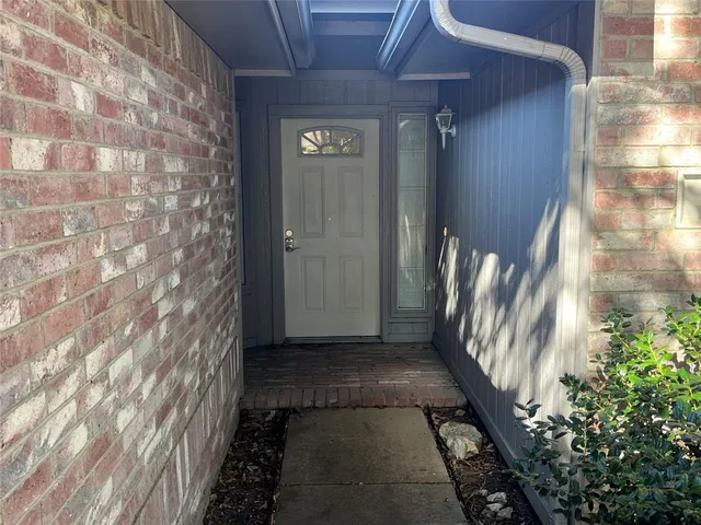a view of a pathway both side of house