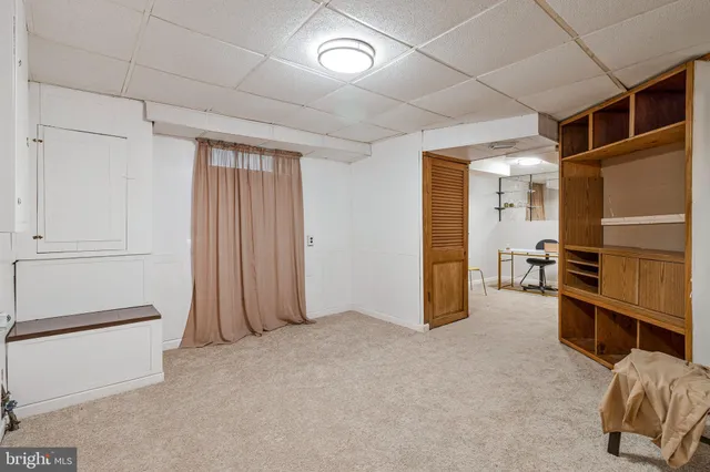 a view of livingroom with closet