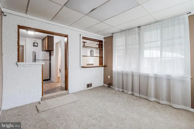 an empty room with windows