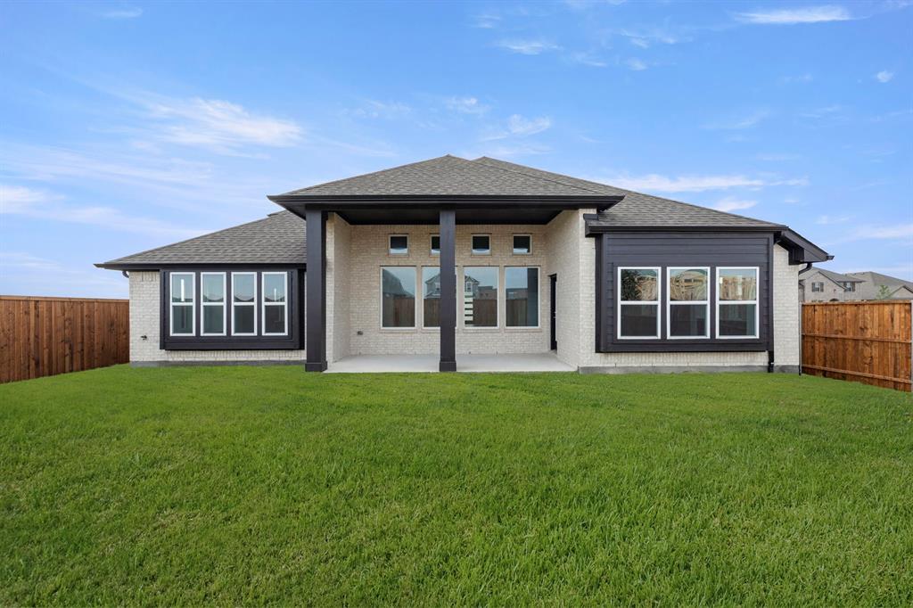 1013 Butterfly Lane Justin, TX 76247 - Photo 25 of 34 1013-butterfly-ln-justin-tx-rear-exterior-yard