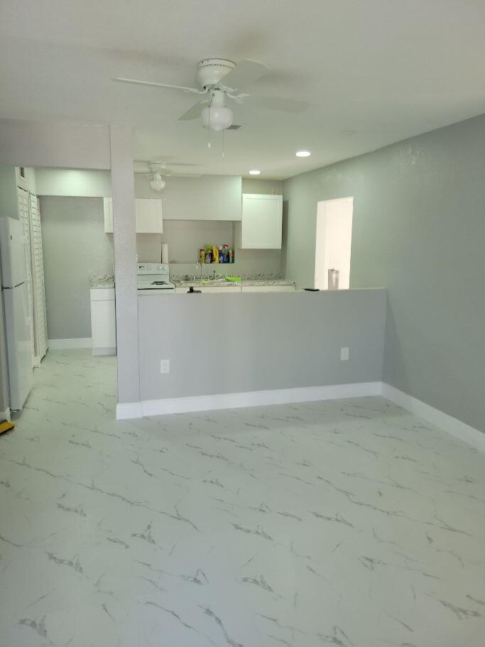 1119 West 32nd Street Riviera Beach, FL 33404 - Photo 15 of 27 1119 32ND LV RM TO KITCHEN