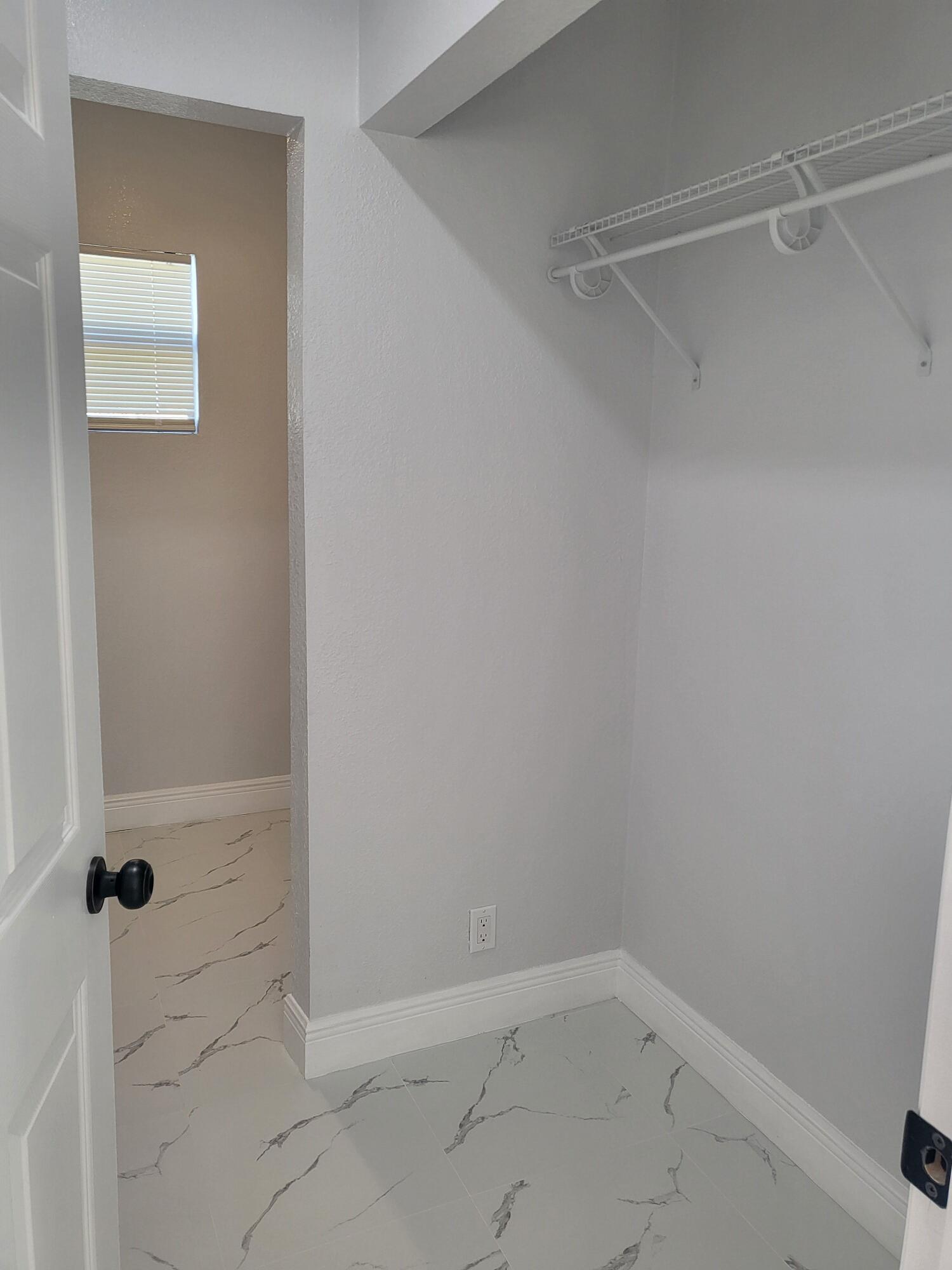 1119 West 32nd Street Riviera Beach, FL 33404 - Photo 19 of 27 1119 32nd master bed rm closet and to la