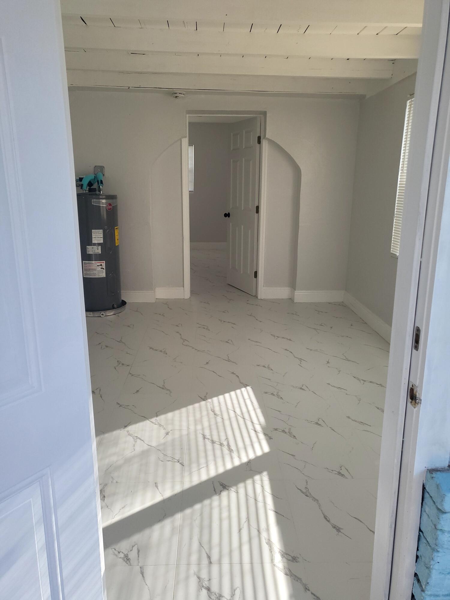 1119 West 32nd Street Riviera Beach, FL 33404 - Photo 22 of 27 1119 32nd entrance from carport