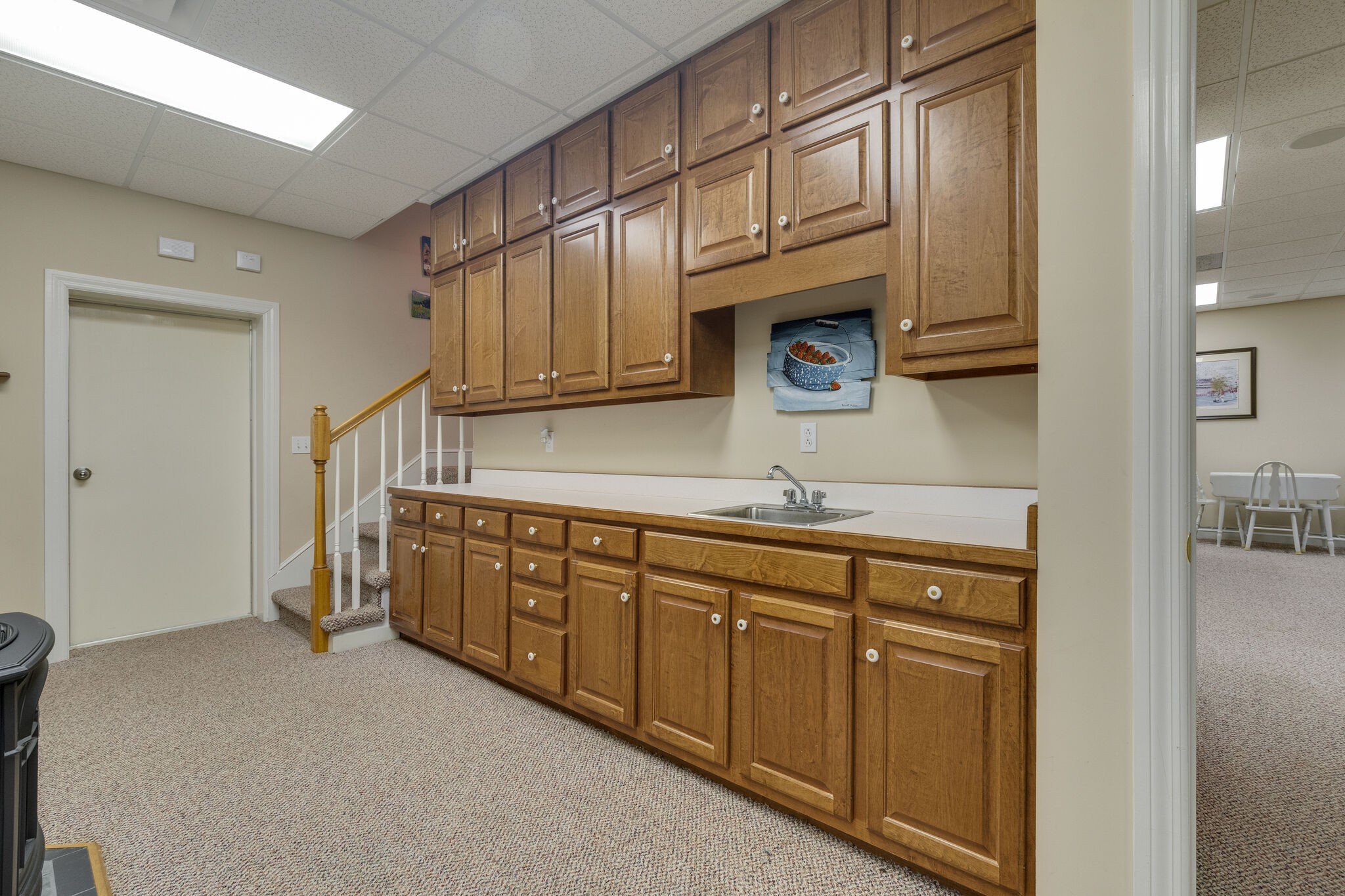 56 Stephens Creek Road Kelso, TN 37348 - Photo 26 of 47 a kitchen with stainless steel appliances granite countertop a sink a stove and cabinets